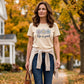 👕 Tricou „Life is Good” — cu imprimeu de margarete, din bumbac 100%, croială lejeră, care transmite un mesaj pozitiv 🌼