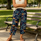 Pantaloni de trening în stil vintage, cu talie înaltă și imprimeu floral