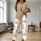 😍 Set de două piese pentru femei: bluză asimetrică și pantaloni trei sferturi