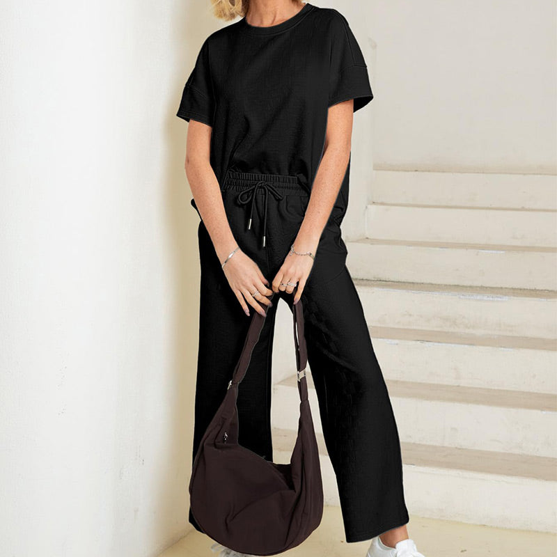 Ofertă limitată🔥 Set pentru femei cu detalii texturate, care include un tricou cu textură bogată și croială lejeră și o pereche de pantaloni cu șnur✨-4