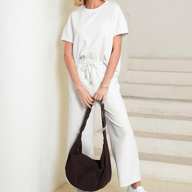 Ofertă limitată🔥 Set pentru femei cu detalii texturate, care include un tricou cu textură bogată și croială lejeră și o pereche de pantaloni cu șnur✨-6