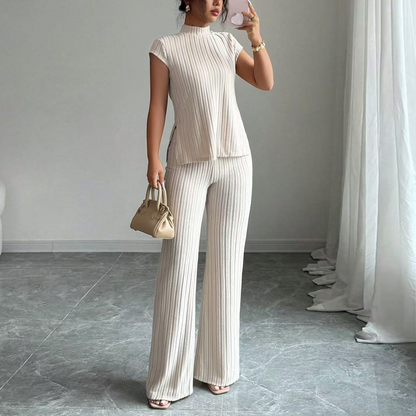 Set din două piese: bluză elegantă cu guler înalt și pantaloni cu croi larg