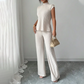 Set din două piese: bluză elegantă cu guler înalt și pantaloni cu croi larg