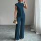 Set din două piese: bluză elegantă cu guler înalt și pantaloni cu croi larg