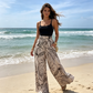 🔥Oferte speciale – Pantaloni largi cu talie înaltă și imprimeu cu frunze, pentru femei🏖️Indispensabili pentru vacanță~😎