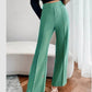 Pantaloni din crep plisați