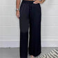 Pantaloni eleganti cu talie reglabilă, picior drept, netezi și largi, cu buzunare