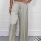 Pantaloni eleganti cu talie reglabilă, picior drept, netezi și largi, cu buzunare