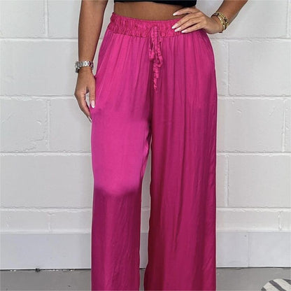 Pantaloni eleganti cu talie reglabilă, picior drept, netezi și largi, cu buzunare
