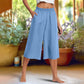 Pantaloni casual, de culoare uni, cu croi larg și lungime 3/4, cu textură discretă