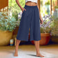 Pantaloni casual, de culoare uni, cu croi larg și lungime 3/4, cu textură discretă