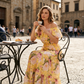 👗 Rochie lungă de vară cu imprimeu floral, cu umerii goi și volane – elegantă, vaporoasă și perfectă pentru zilele însorite 🌸☀️