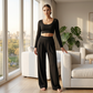 Set pentru femei compus din un top scurt casual și pantaloni cu croi larg