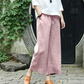 Pantaloni casual, cu croială largă și șnur, prevăzuți cu buzunare