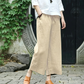 Pantaloni casual, cu croială largă și șnur, prevăzuți cu buzunare