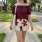 Set pentru femei compus din un top cu umerii descoperiți și pantaloni scurți cu imprimeu floral
