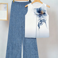 Set pentru femei compus din un top cu imprimeu floral și pantaloni cu croi larg