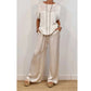 Set elegant pentru femei, compus din un top și pantaloni cu croi larg