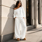Sett med avslappet off-shoulder-top og bukser med vide ben for damer