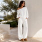 Sett med avslappet off-shoulder-top og bukser med vide ben for damer