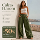 Pantaloni balon voluminoși, cu pliuri și buzunare